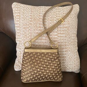 Tianni Gold Woven Handbag.